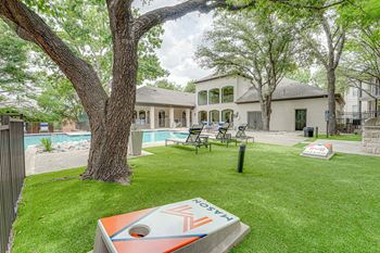 take a dip in the pool at villas at houston levee west apartments in cord  at Mason, Texas, 75069